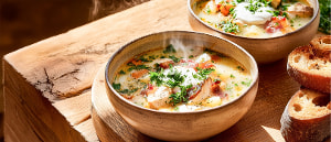 Cremige Wurzelgem&uuml;sesuppe mit Huhn und Speck